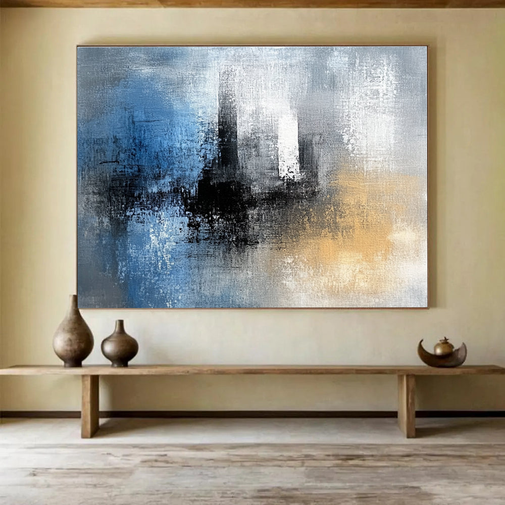 Abstract painting featuring blue black and white textures with gray yellow and brown hues complemented by a tower silhouette in the background.SC032