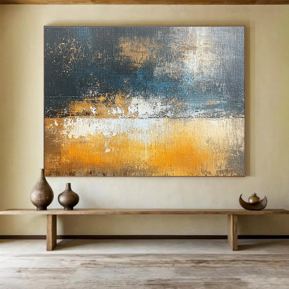 Large abstract oil painting depicting an urban landscape in dark gray and light amber with brown and blue accents using large brush strokes.SC109