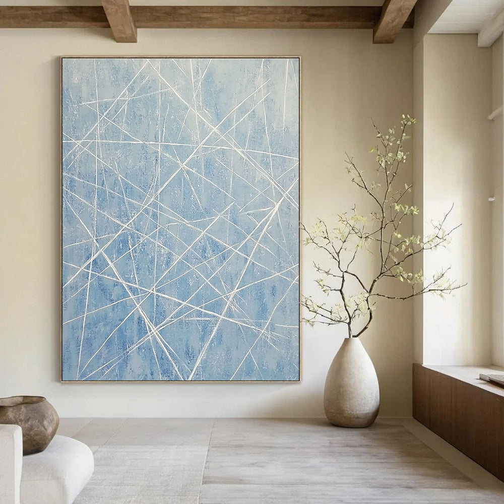 Large abstract painting of light blue and white lines resembling an icy landscape with vertical lines and frozen icicle-like formations.STSC316