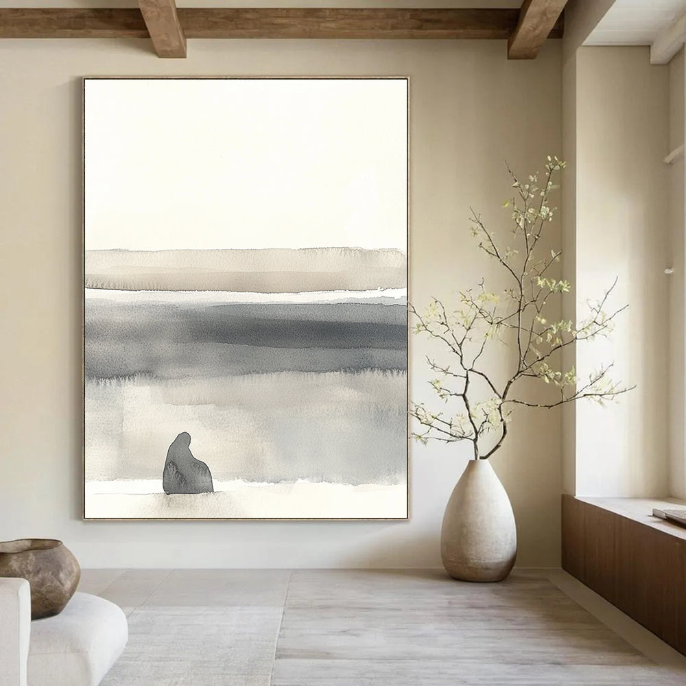 Large abstract painting in soft whites and grays featuring minimalistic landscape with organic shapes and muted tones for a serene atmosphere.STSC1465