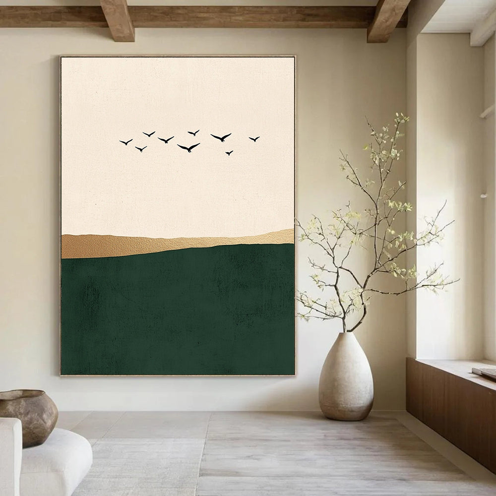 Abstract art featuring minimalist Japandi style with flying birds over a serene green sea on a beige background adorned with elegant gold details.STSC1340