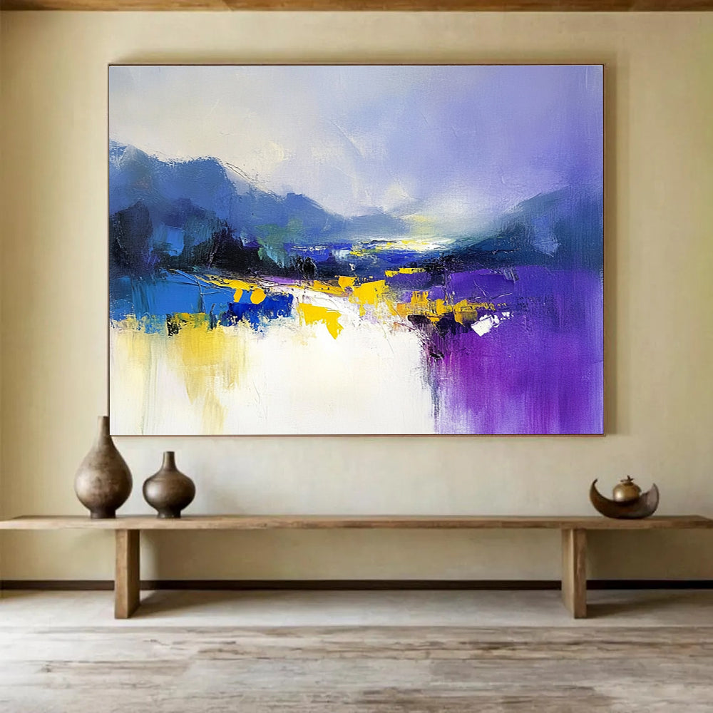 Large abstract painting featuring soft purple and blue hues with yellow accents created using loose brush strokes for a calming effect.SC317