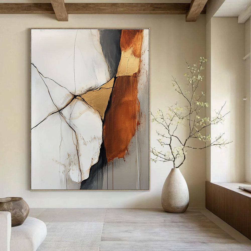 Large abstract painting featuring an off white and rust colored rock with gold veins in a minimalistic style and soft delicate strokes.STSC655