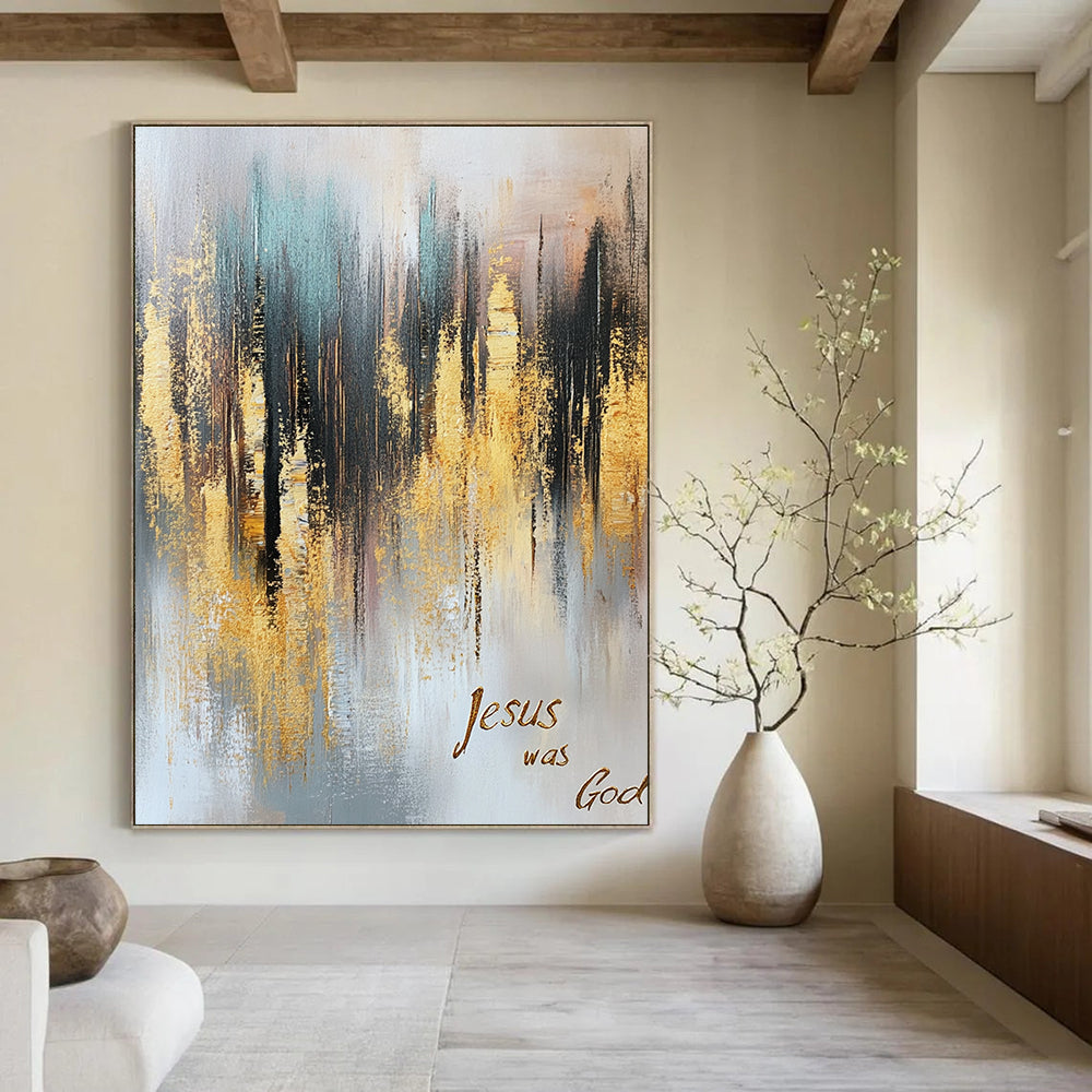 Large abstract oil painting of a gold and gray forest with muted colors gold foil accents and cursive text stating Jesus was God.STSC166