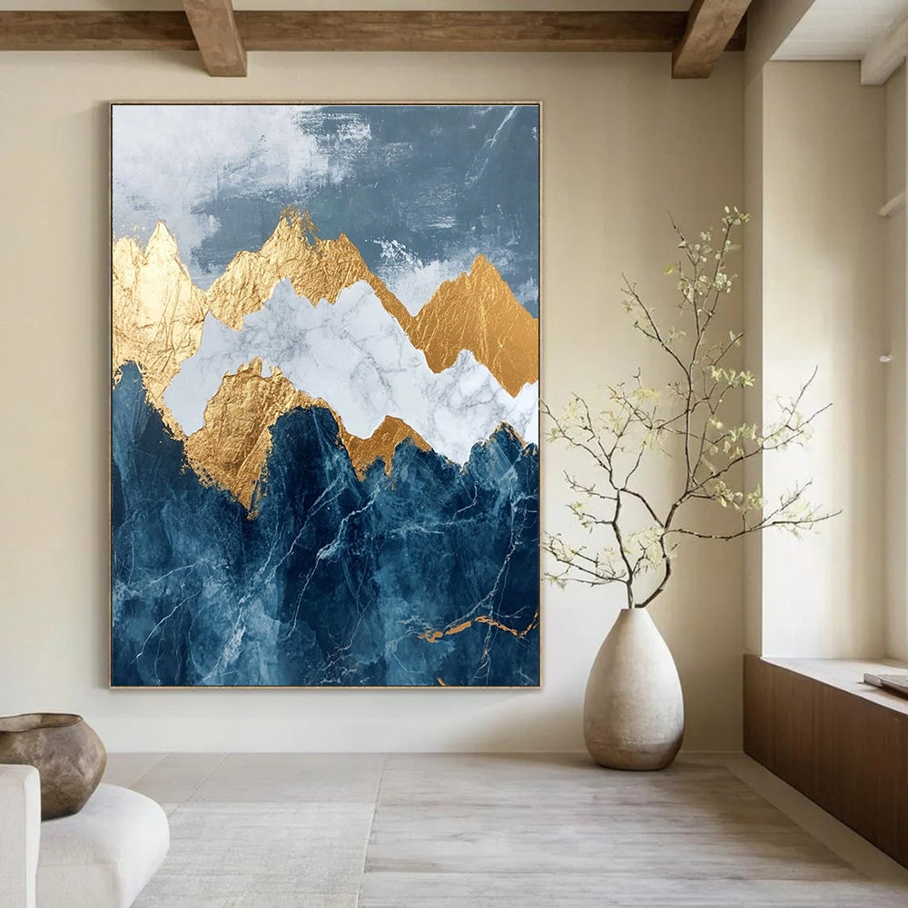 Abstract marble and gold leaf painting of mountains in dark blue and white features intricate details with stunning golden accents.STSC122