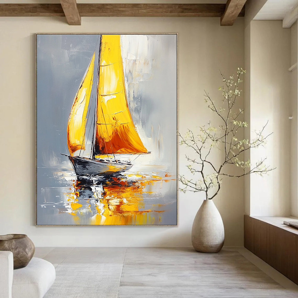 Large abstract painting of a sailboat with yellow sails on water featuring gray background and warm colors with soft lighting and bold brushstrokes.STSC1400