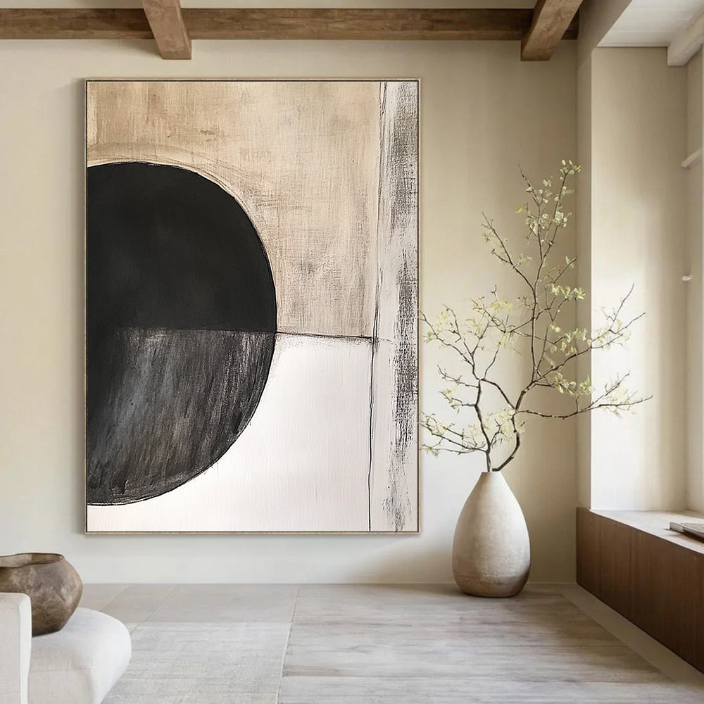 Large abstract painting featuring an oval black circle with dark grey texture on beige textured background by Peter Cresely.STSC664