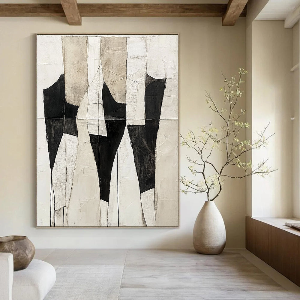 Large abstract painting featuring a light white and black color scheme with ivory cream background and textured body shapes in dark gray and white.STSC403