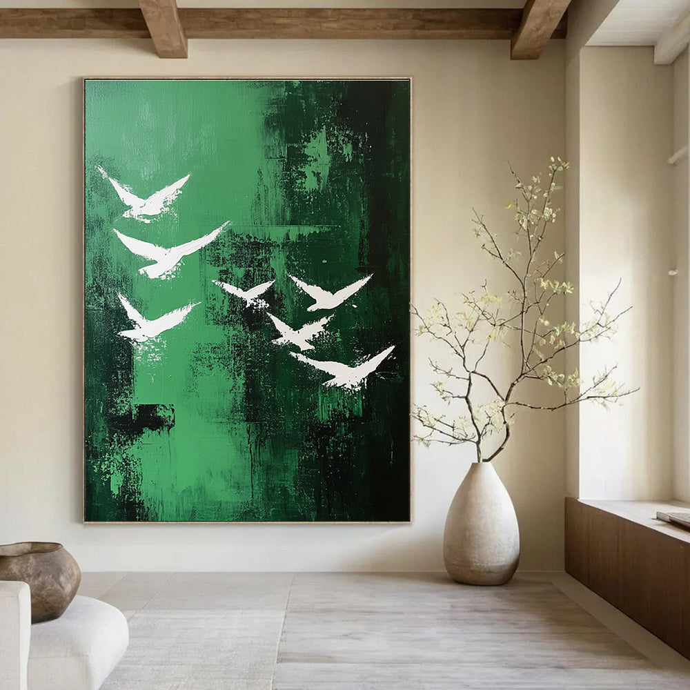 Abstract painting featuring white birds soaring over a vibrant emerald green landscape in a minimalistic style.STSC362