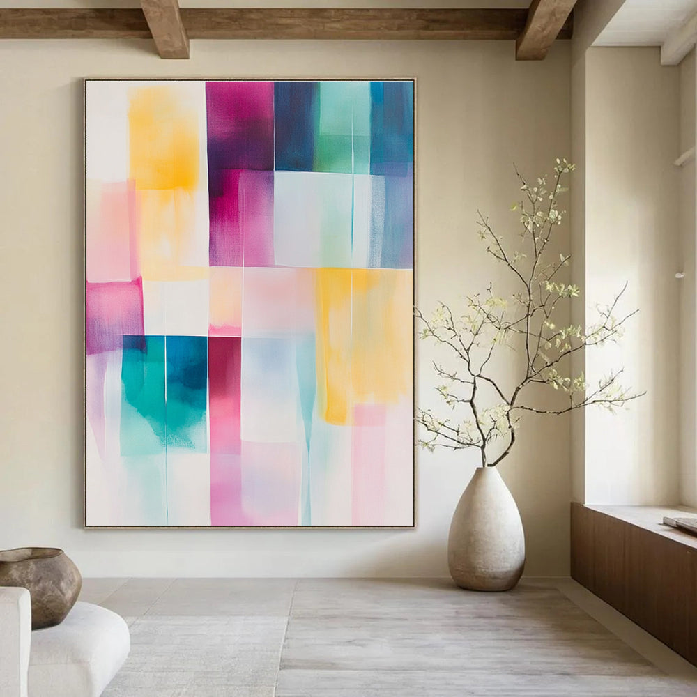 Large abstract painting in soft pastel colors featuring geometric blocks of pink yellow teal and white for a calming artistic touch.STSC804