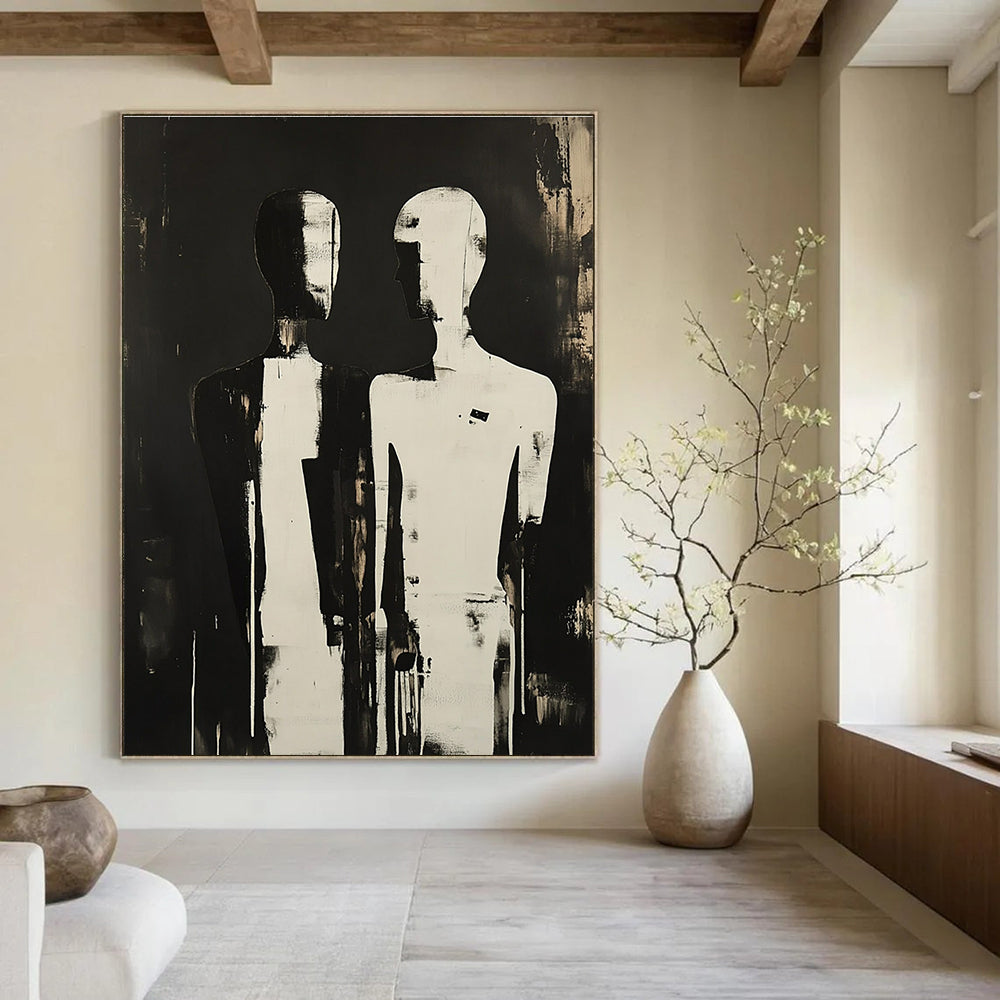 A large abstract painting featuring two silhouetted figures with elongated and featureless heads, evoking mystery and emotional connection against a dark backdrop.STSC908