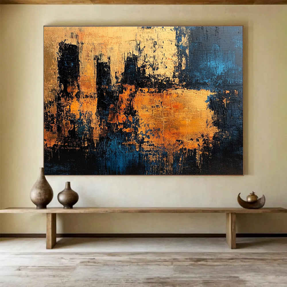 Large abstract painting with textured surface in dark blue and gold suggesting an ancient castle wall radiating warmth and history.SC371