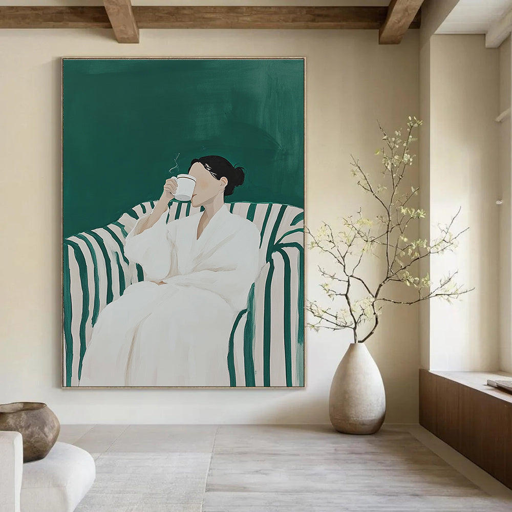 A large abstract painting featuring a woman in a white robe sipping coffee on a striped sofa with a vibrant green background.STSC1122