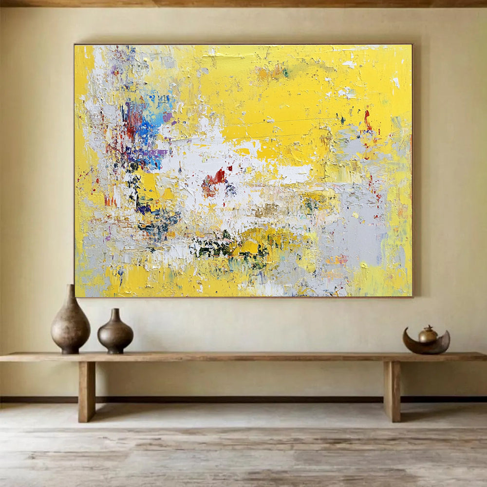 Large abstract painting in yellow and grey with hints of blue green white and red soft textured brushstrokes evoking nostalgia and contemplation.SC370
