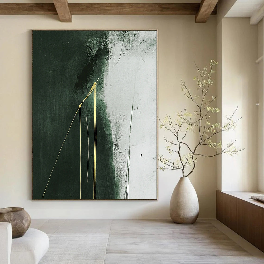 Large abstract painting with dark gray background featuring white and green hues and two growing yellow lines creating a minimalist composition.STSC1241