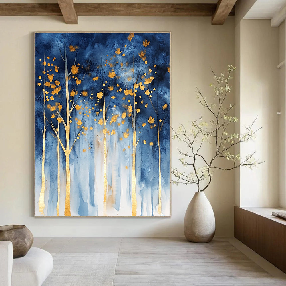 Abstract forest in watercolor with blue and gold hues and gold foil accents featuring trees with golden leaves against a dark sky.STSC059
