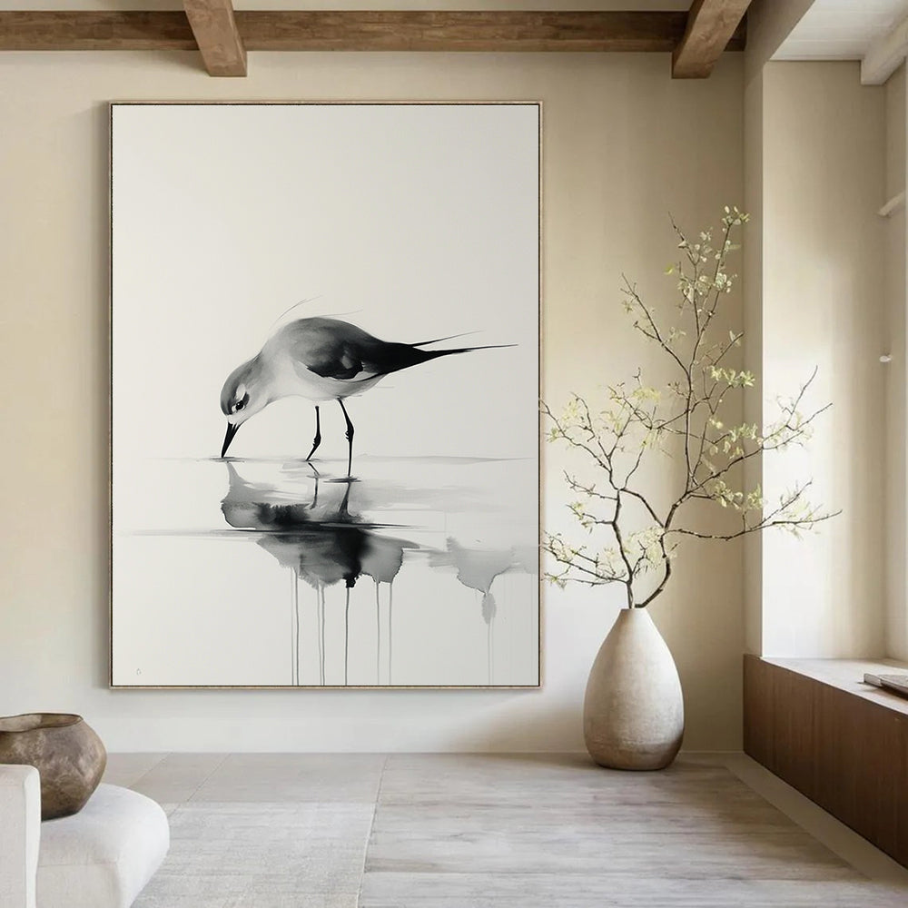 A large abstract painting featuring a bird walking on water with delicate brushstrokes in black and gray tones against a white background.STSC906