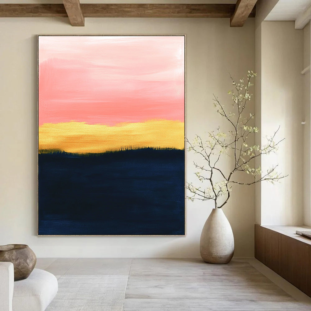 Large abstract painting with a pink sky navy blue ground and golden brown grass featuring soft pastel colors and minimalist design in oil on canvas.STSC1345