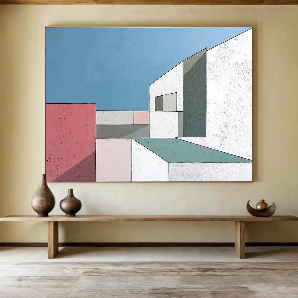 A large abstract painting featuring minimalist white buildings with large windows against a serene blue sky highlighting sharp color contrasts and geometric shapes.SC487