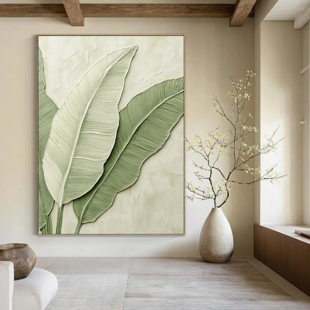 A large abstract painting of banana leaves in light green tones on a beige background, perfect for enhancing any modern space.STSC002
