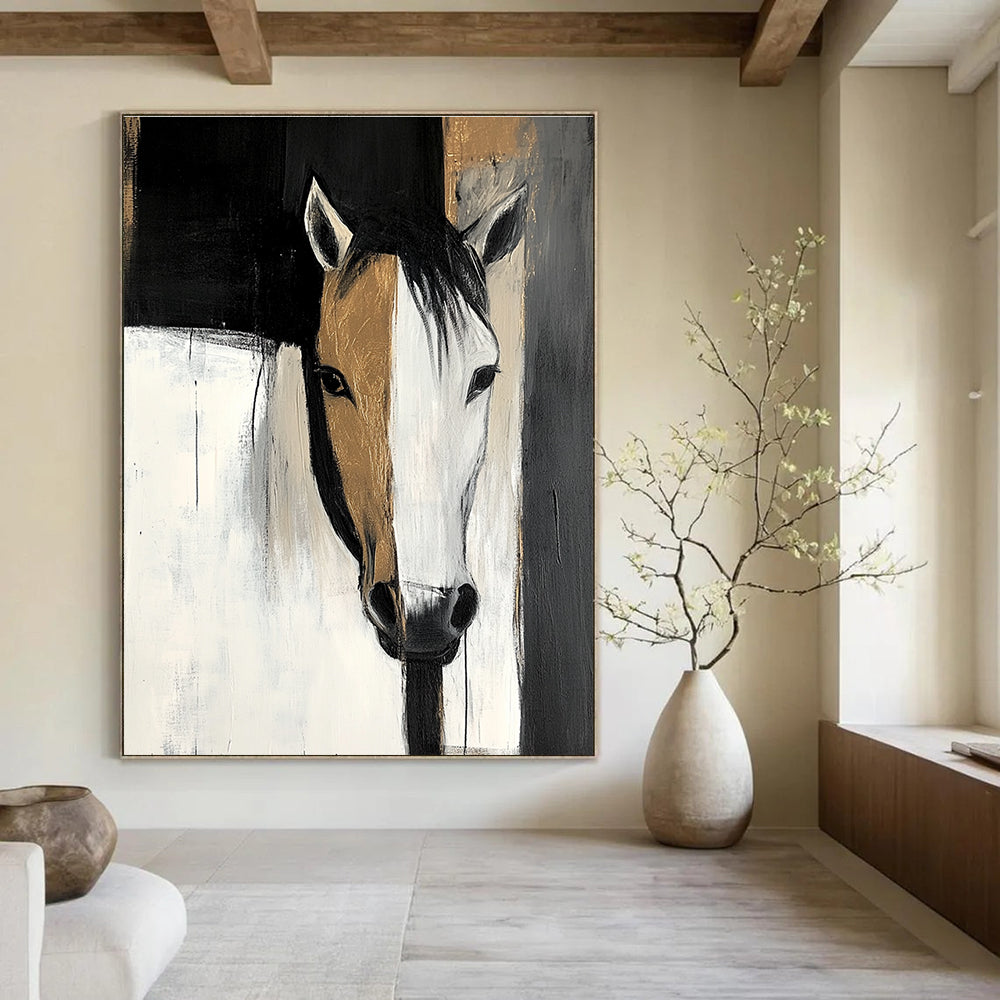 Large abstract painting featuring black and white shapes with gold highlights and a horse's head emerging from shadows conveying mystery and depth.STSC214