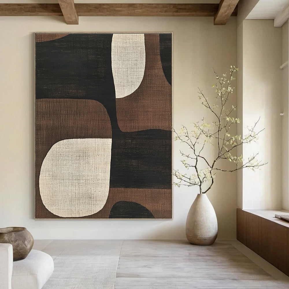Abstract artwork featuring mid-century modern designs with simple shapes in neutral tones of black brown beige and white enhancing any space.STSC1320