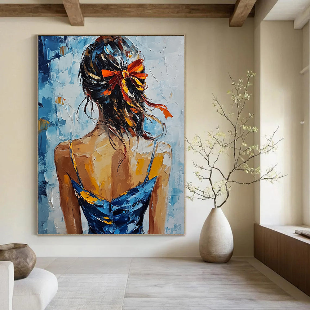 A large abstract painting featuring an elegant woman in a blue and yellow dress with red ribbons against a soft blue and white background.STSC879
