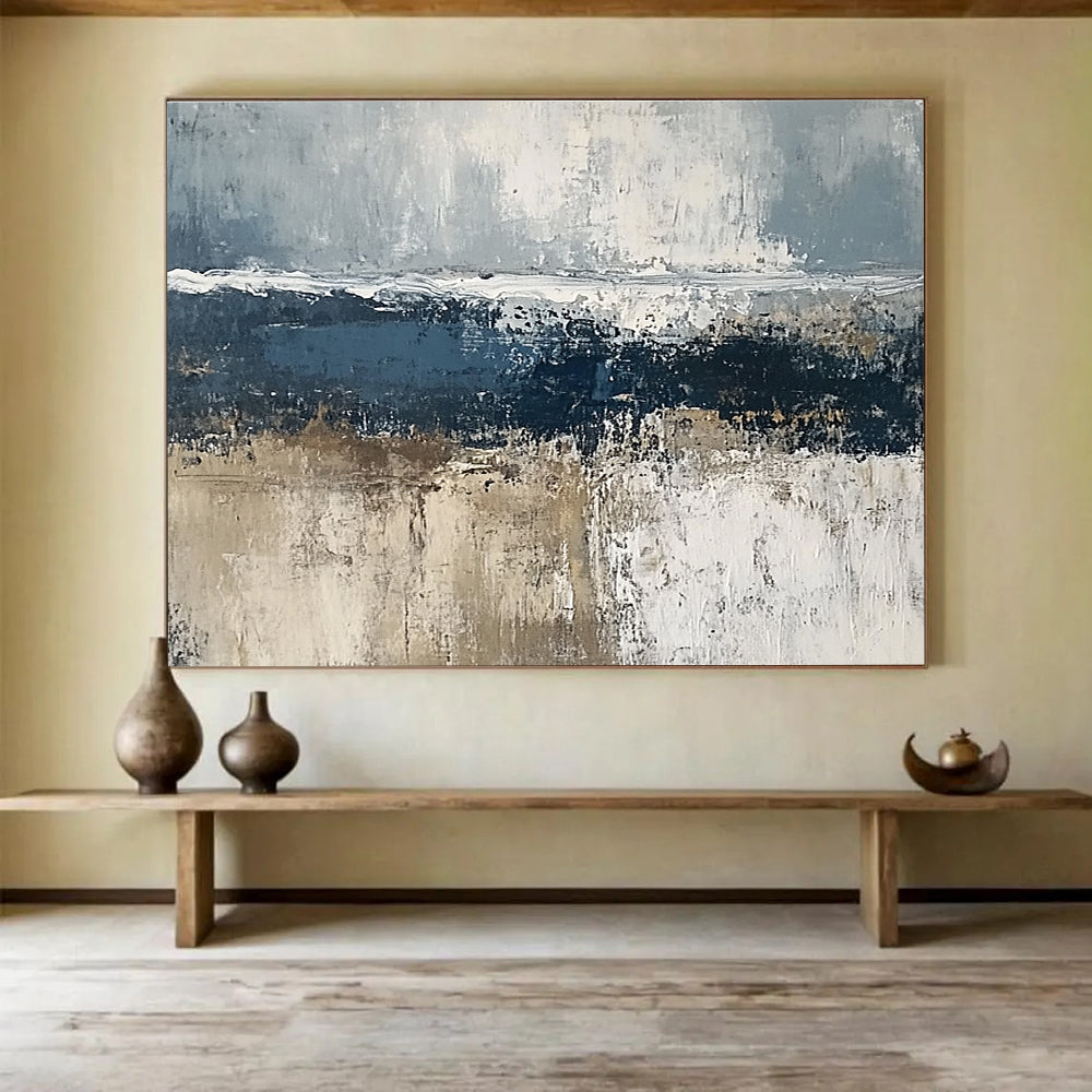 Large abstract painting of the sea featuring gray and dark blue tones with brown accents and thick textured paint.SC203