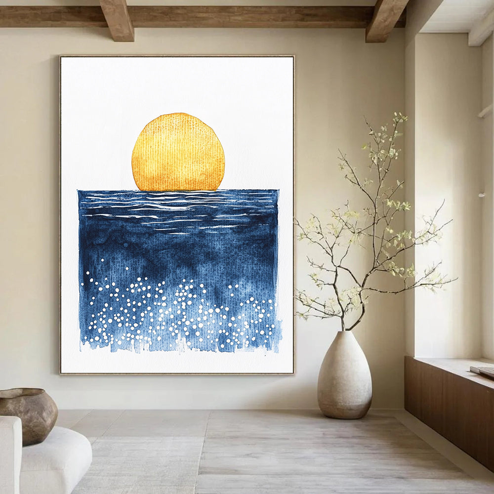 Large abstract watercolor painting of a sun rising over the ocean in minimalist style featuring blue yellow and white dots.STSC506