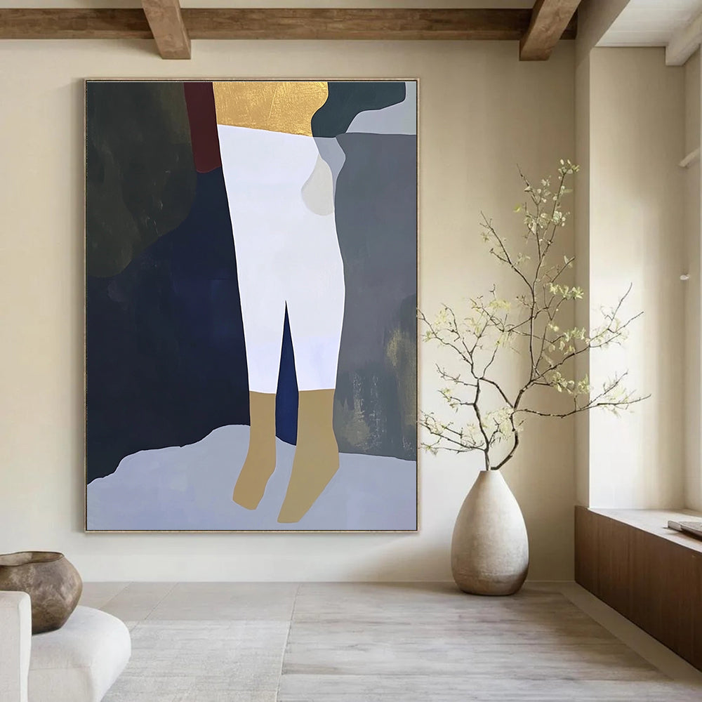 A large abstract painting featuring a close-up of a leg in white trousers and gold socks on a dark grey background in soft colors.STSC960