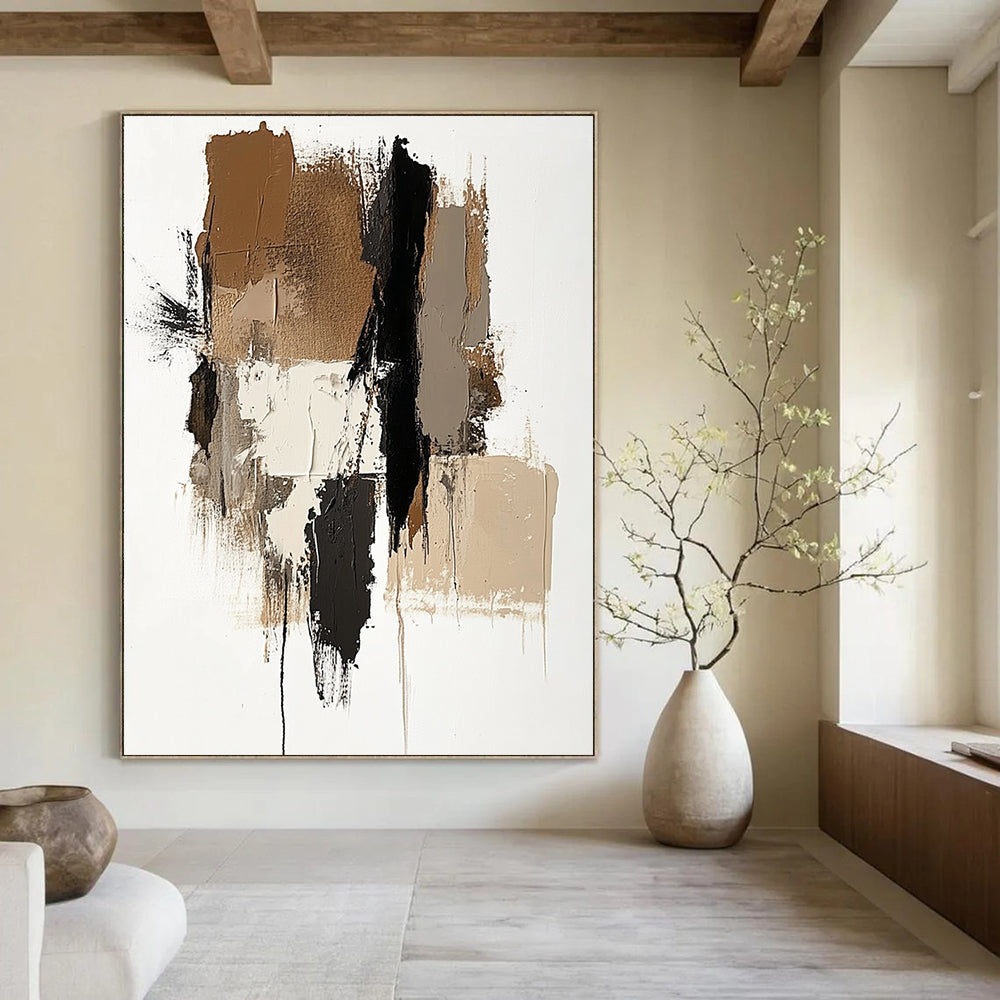 Large abstract painting featuring brown beige and white colors with a prominent gray shape and vertical navy blue detail.STSC677