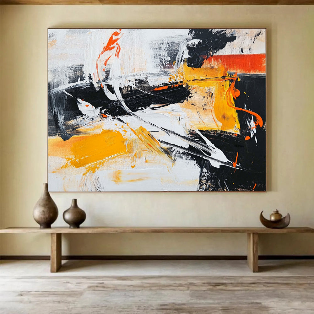 Large abstract painting in black white and orange featuring vibrant yellow brush strokes for a dynamic artistic touch.SC142