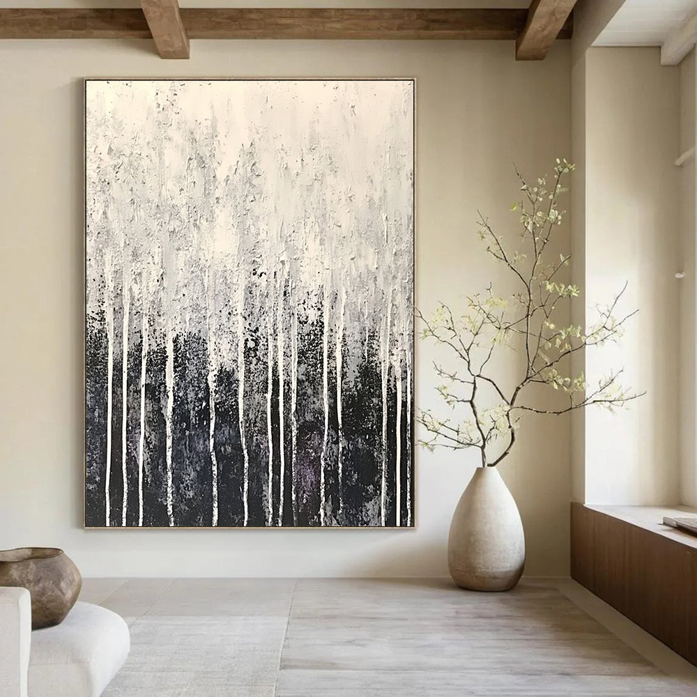 Large abstract painting in white and gray with drip effects and fine droplets resembling frost creating a serene winter atmosphere.STSC360