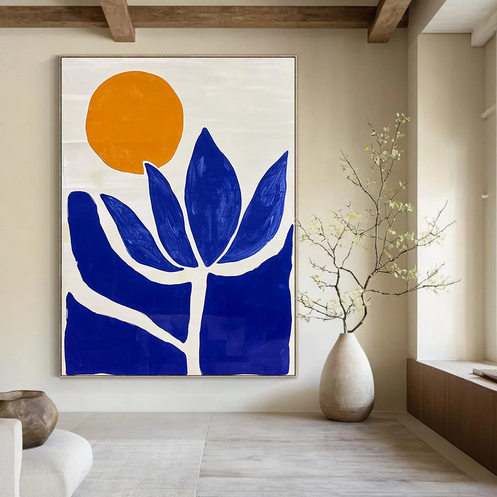 Large abstract painting featuring minimalist blue and white Matisse-inspired shapes and a vibrant orange sun with a blue lotus flower.STSC1332