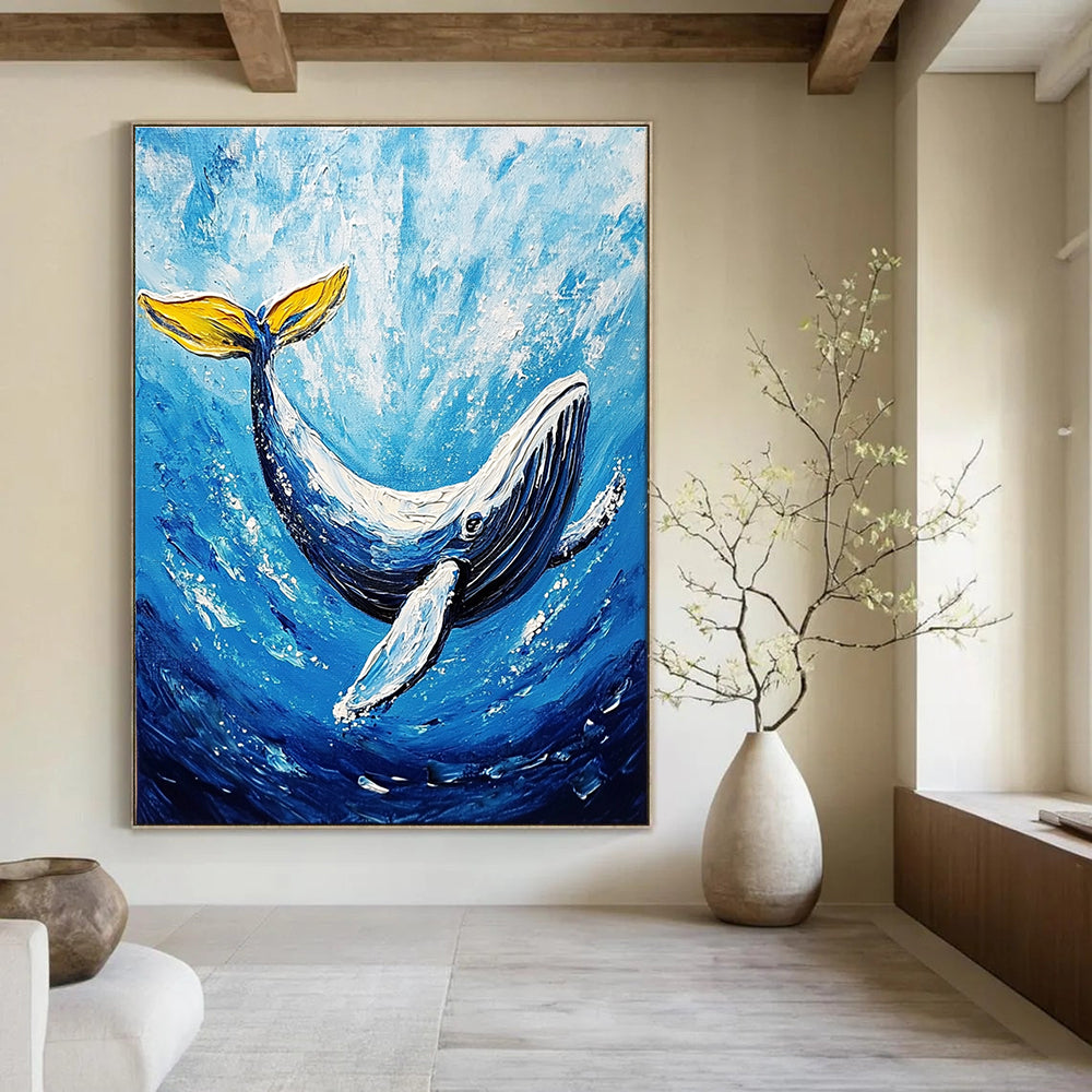 A large abstract painting featuring a majestic whale gliding through deep blue waters in vibrant acrylic colors.STSC1052
