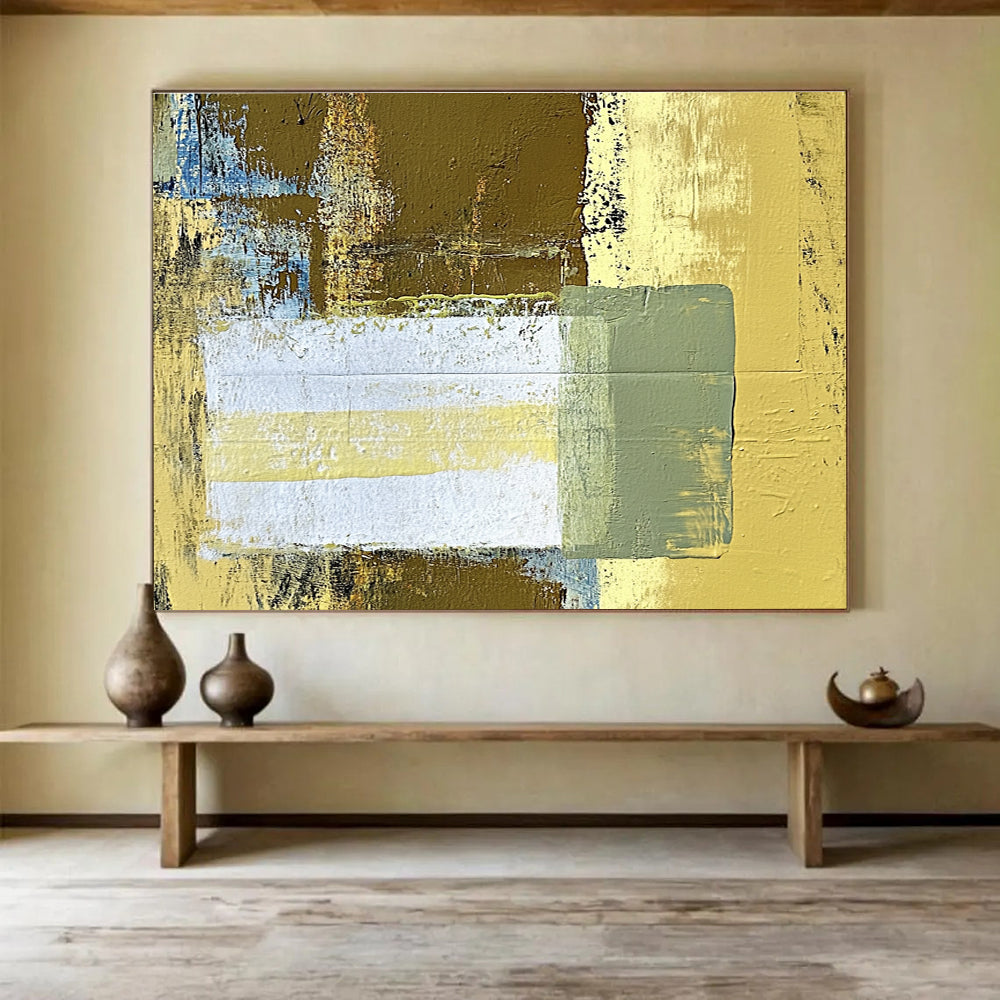 Large abstract painting featuring beige and yellow tones with a central white rectangle and green stripe against a dark brown background.SC425