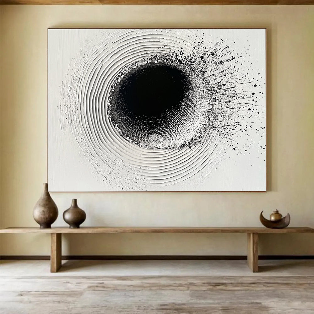 An abstract painting featuring a circular hole filled with water droplets creating ripples on a white plaster background with black ink lines.SC435