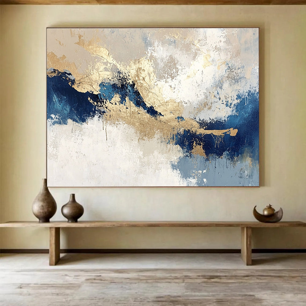 Large abstract painting in blue and gold on textured beige and white background featuring light gray and dark indigo tones for a stunning decor.SC023