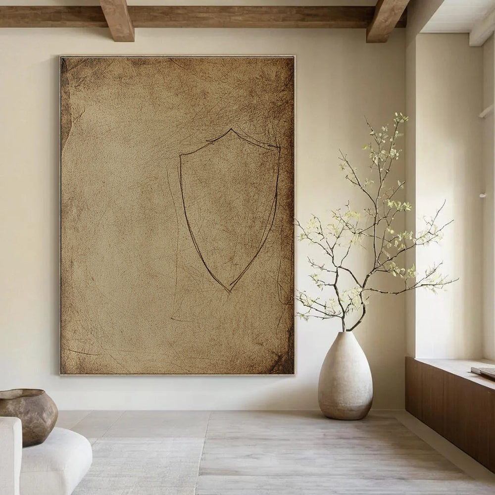 Large abstract drawing of an ancient shield silhouette on aged paper with rough edges and dusty marks resembling early human civilization cave art.STSC987