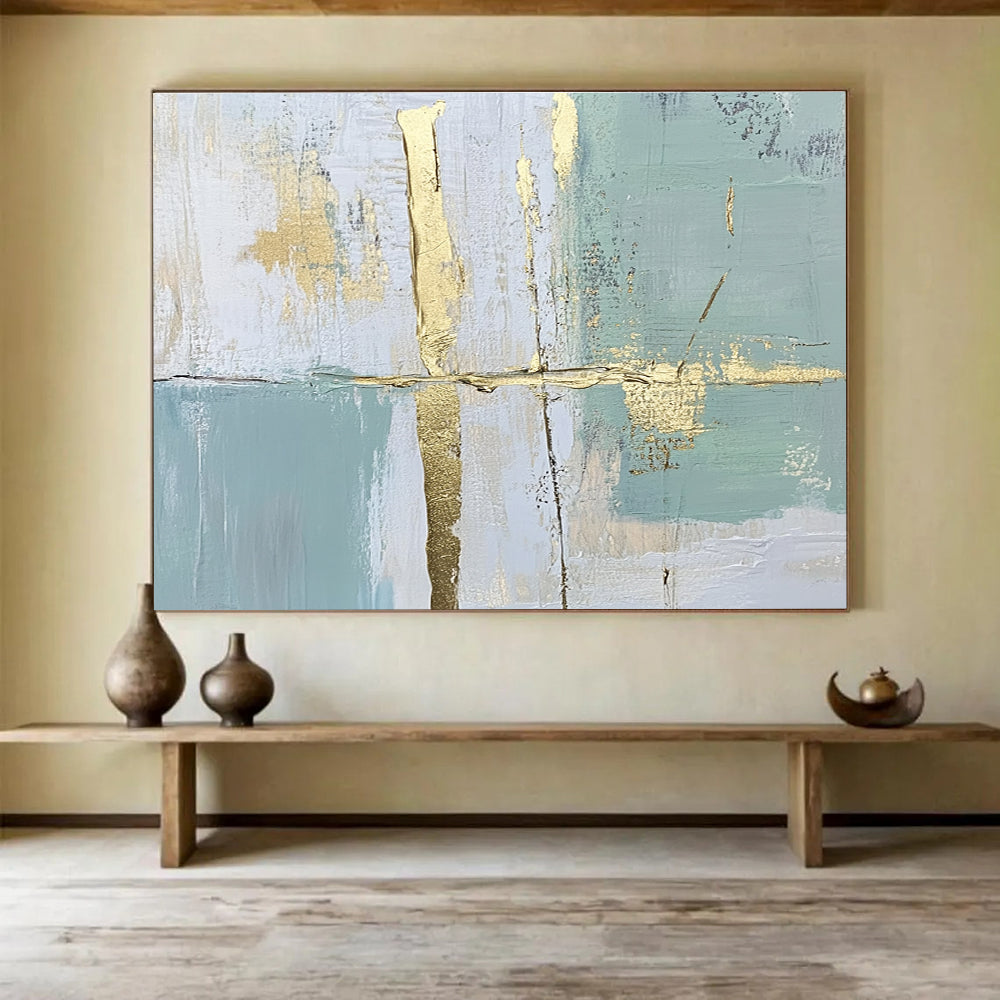 Large abstract painting with pale green and blue lines and shapes enhanced by gold foil accents for an elegant touch.SC326