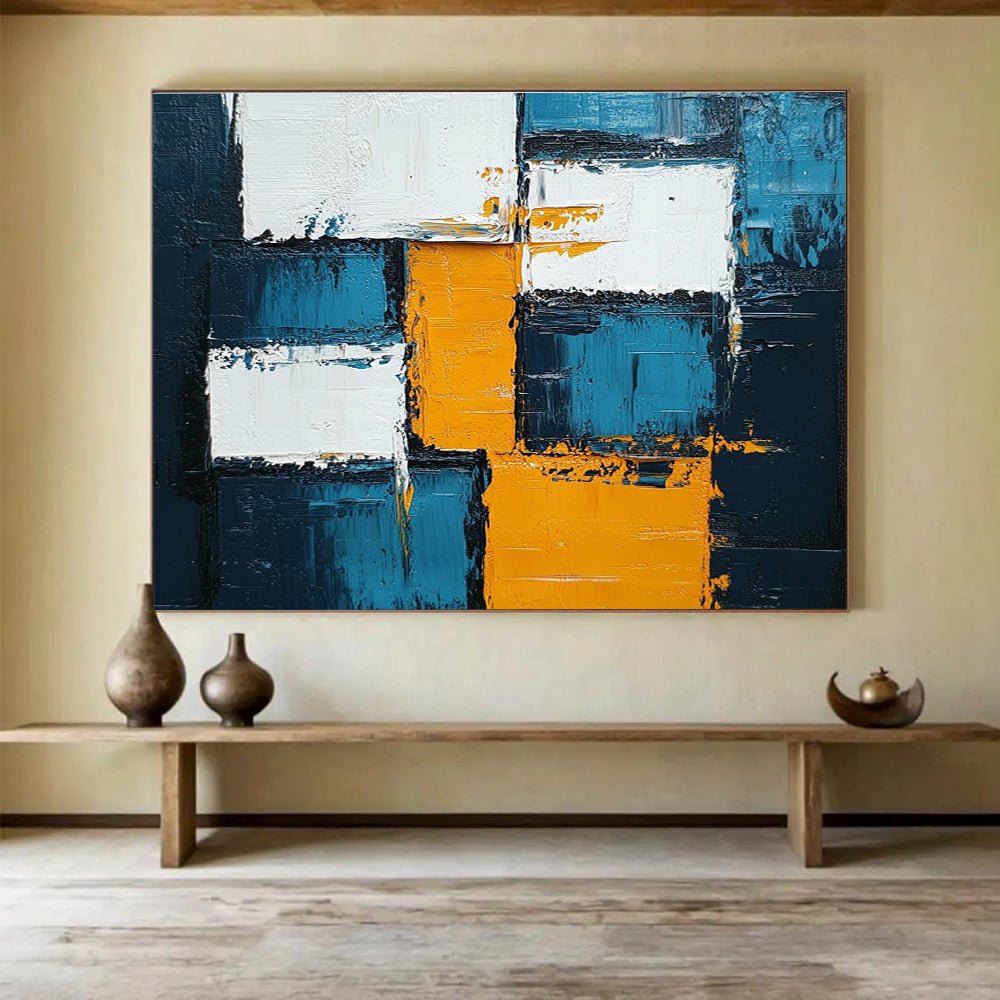 Large abstract painting featuring blue, white, and yellow squares with thick impasto texture, embodying bold expressionism for any modern space.SC122