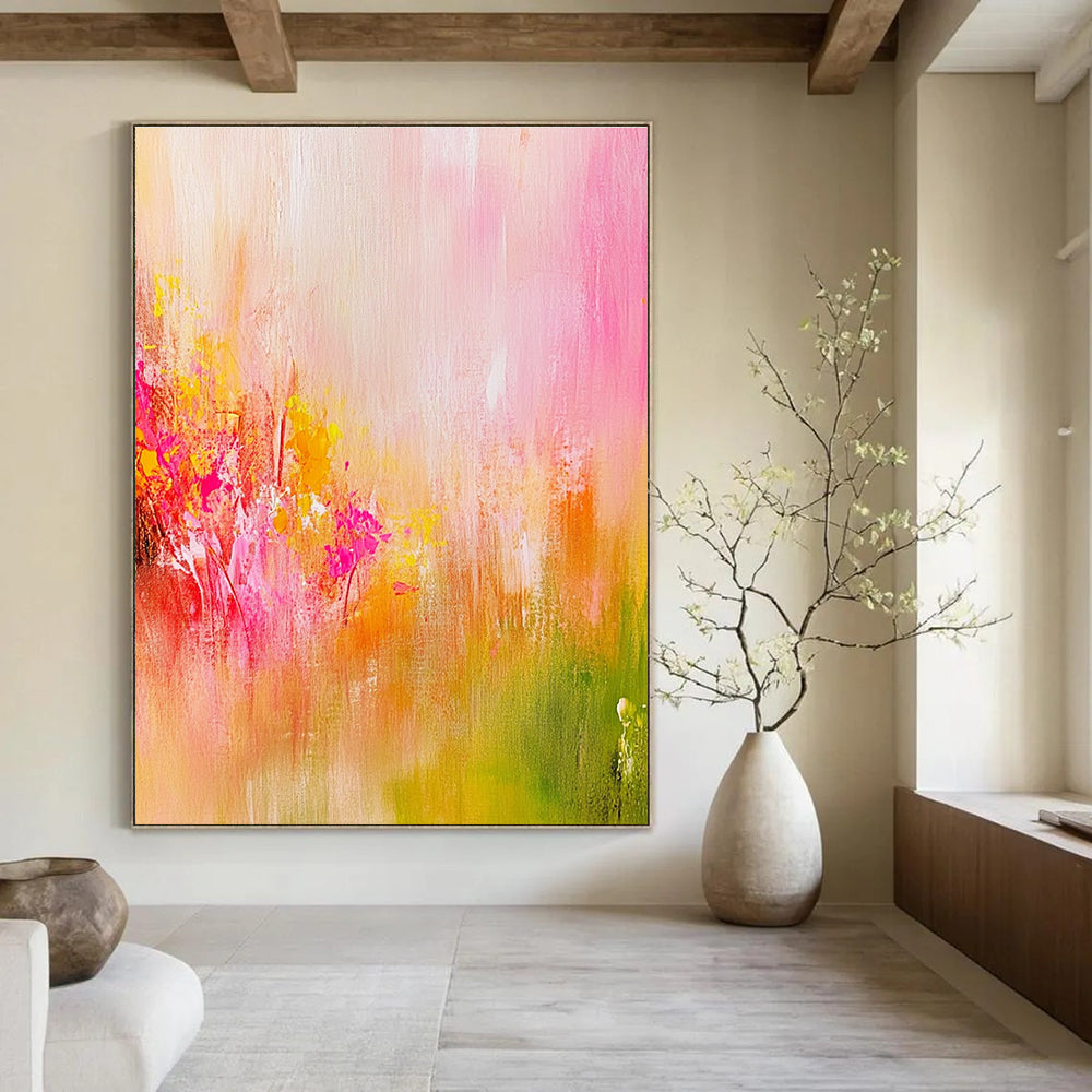 Large abstract painting in soft pink and yellow tones with delicate brushstrokes and a vibrant background evoking a romantic dreamy atmosphere.STSC489