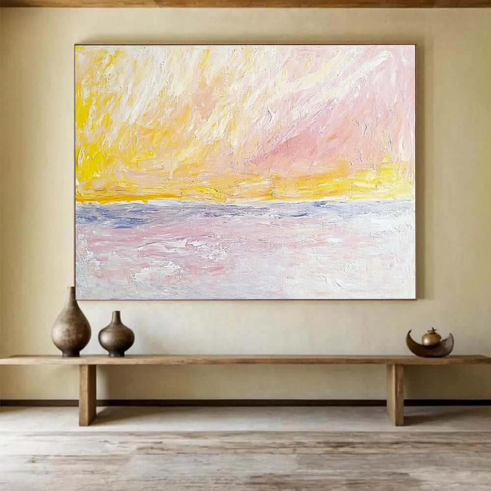 Large abstract painting of sky and sea in Turner style featuring pale pink yellow and beige colors with bold brush strokes.SC365