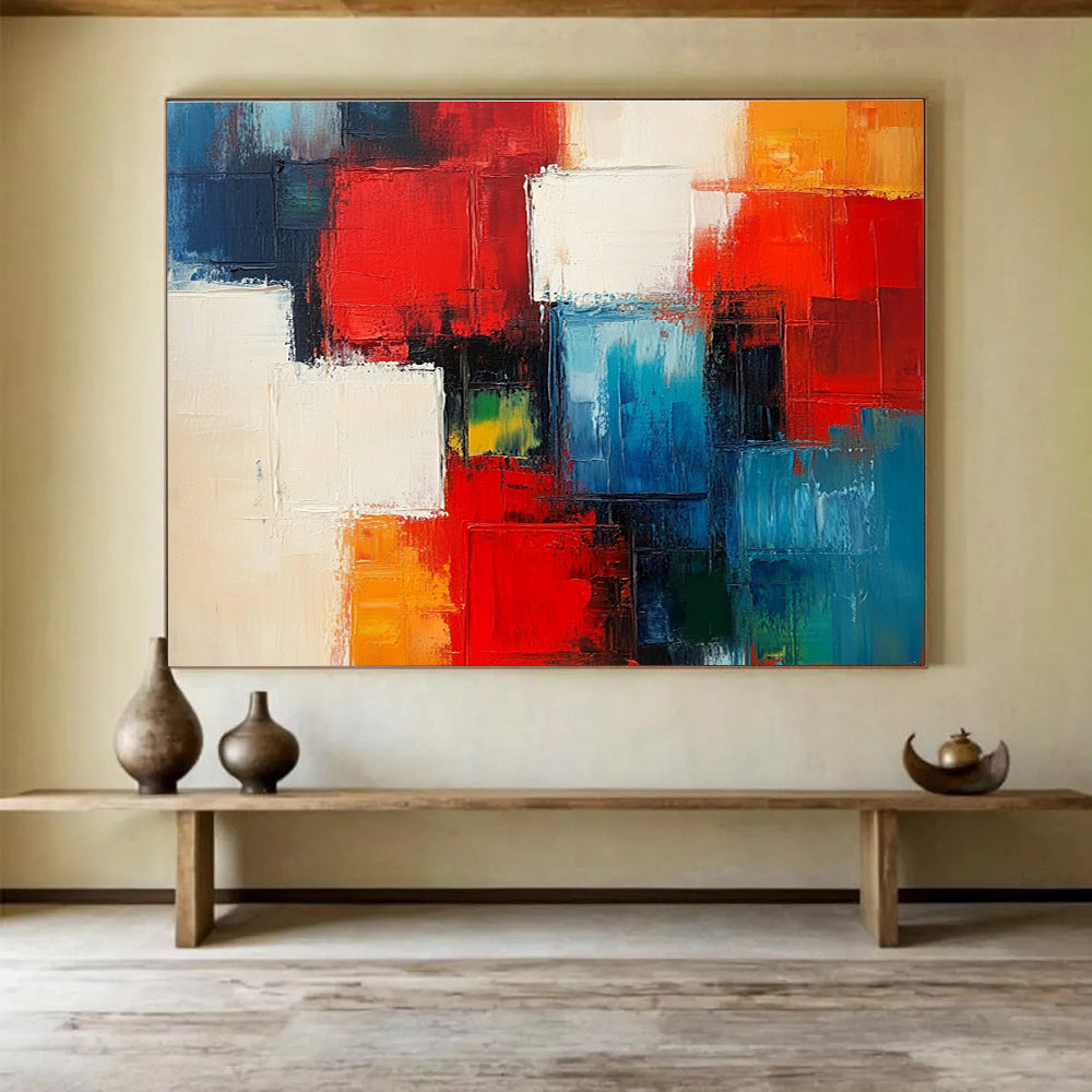 A large abstract painting of city blocks in red and blue with white squares and thick brush strokes.SC347