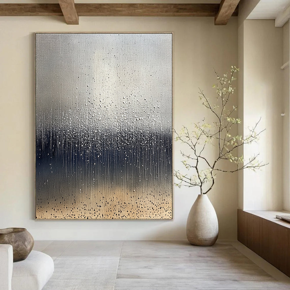 Large abstract painting depicting raindrops on brown soil with a cool gray background and splashing water droplets in dark blue and white tones.STSC1399