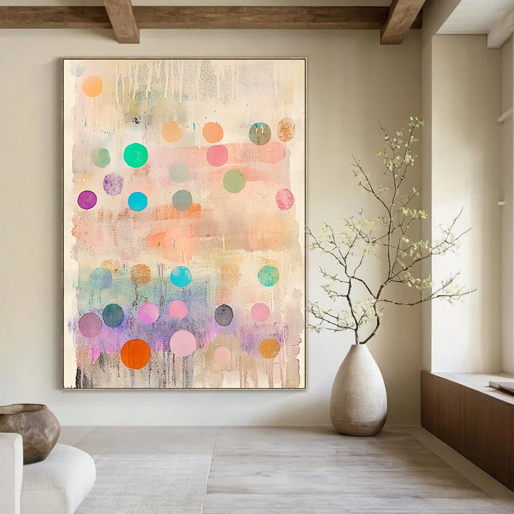 Large abstract painting featuring delicate pastel colors with whimsical round shapes and vibrant polka dot stripes creating an organic depth and dreamy quality.STSC1043