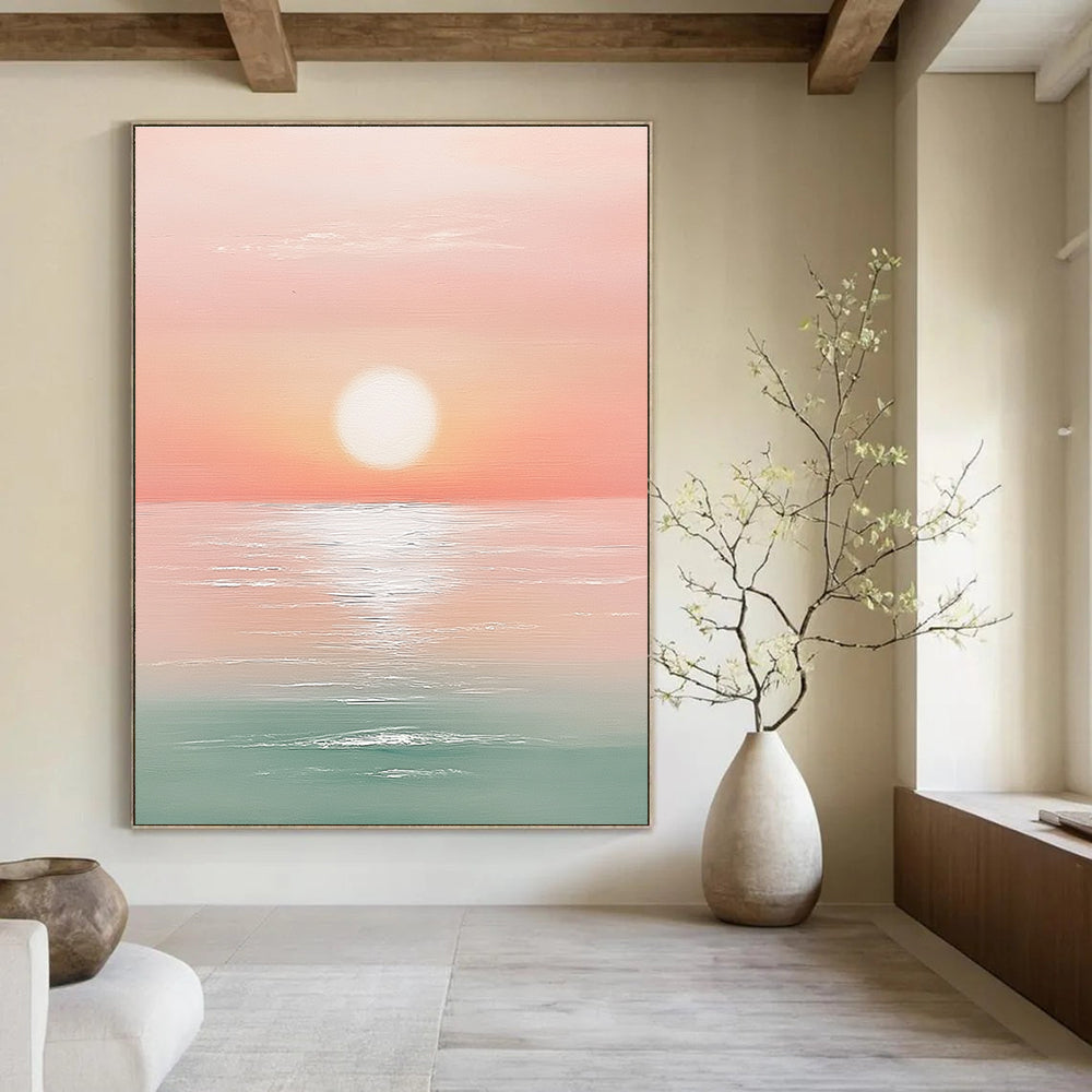 A large abstract painting featuring a sunset over the ocean in pastel pink and mint green with a white sun at the center.STSC1425