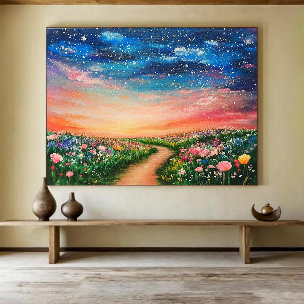 A large abstract painting of a dreamy field adorned with colorful flowers under a starry sky and a pink sunset, evoking a magical atmosphere.SC397