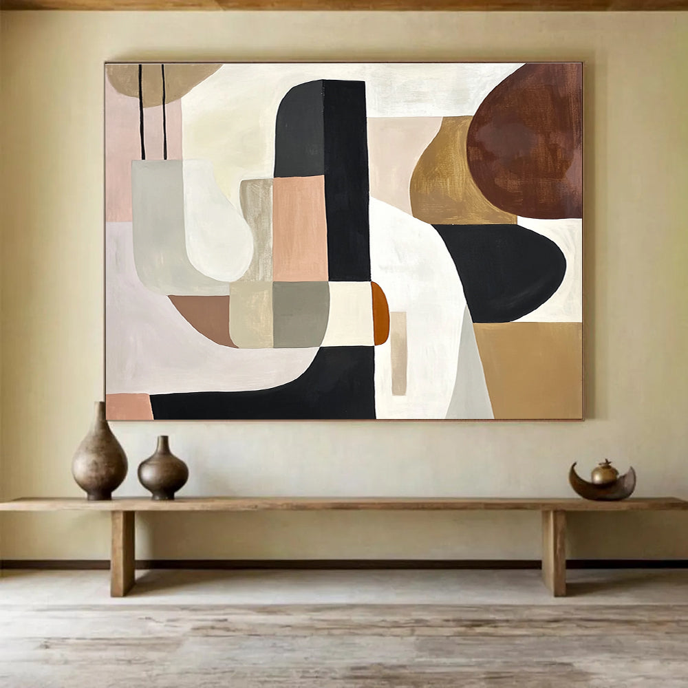 An abstract painting featuring elegant shapes in white, black, and brown, accented with soft beige, pink, grey, and cream tones and brown wood elements.SC352