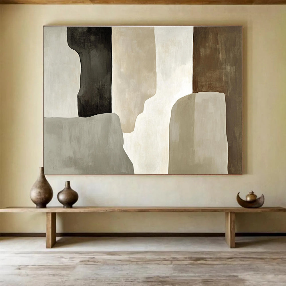 Large abstract painting featuring soft gray and beige tones with loose brush strokes and a prominent black shadow and tall monolithic shape.SC280